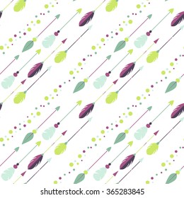 Tribal arrow seamless pattern. Green, mint and purple arrows and dots arranged in diagonal oblique rows.