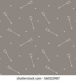 Tribal arrows hand drawn pattern, Seamless vector doodle background with arrows. White arrows on brown background.