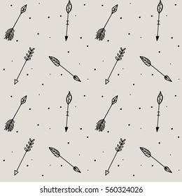 Patrón de flechas tribales, fondo de doodle vectorial sin fisuras dibujado a mano. Flechas negras sobre fondo beige.