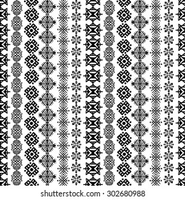 Tribal art boho seamless pattern. Ethnic geometric print. Repeating border background texture in black and white. Fabric, cloth design, wallpaper, wrapping