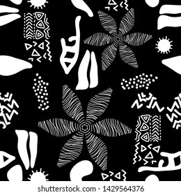 Tribal Art Print. Seamless vector pattern inspired by African textile. Ethnic design collection. Black and white doodles.