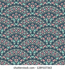 Tribal art seamless pattern. Ethnic geometric print. Mosaic colorful repeating texture.