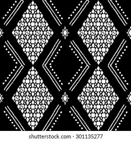 Tribal art seamless pattern. Ethnic geometric print. Arabic repeating background texture in black and white. Fabric, cloth design, wallpaper, wrapping