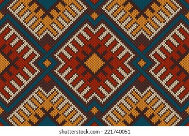 Tribal Aztec seamless pattern on the wool knitted texture