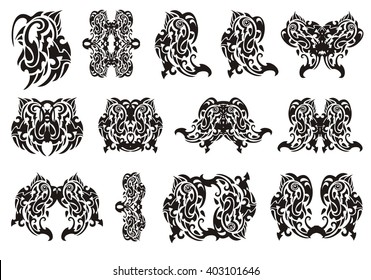 Tribal birds symbols. Owls, parrots, the wings of a butterfly and other symbols formed from tribal butterfly wing 