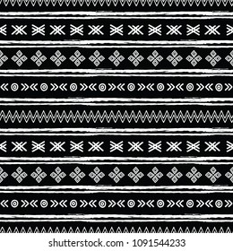 Tribal black and white seamless repeat pattern. Great for folk modern wallpaper, backgrounds, invitations, packaging design projects. Surface pattern design.