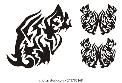 Tribal butterfly wing in the dragon head form and butterflies tattoo