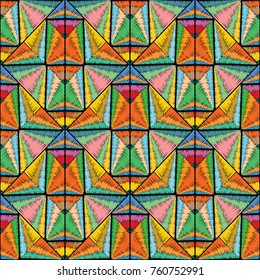 Tribal colorful tiled seamless pattern. Ethnic bright abstract grunge background fabric wallpaper with multicolor geometric shapes, figures, squares, triangles. Tapestry texture. Embroidery design.