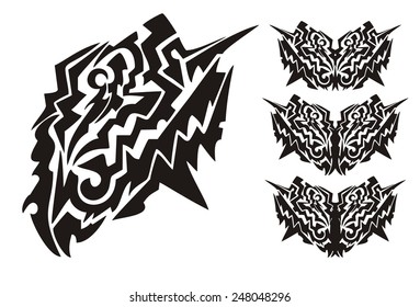 Tribal dangerous butterfly wings. Black on the white. Tribal tattoos of peaked wings of a butterfly