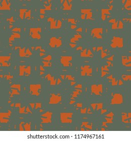 Tribal decoration with abstract geometric shapes and fragmented wavy stripes. Textile pattern in green and orange shades. Vector illustration.