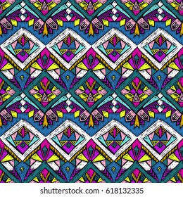 Tribal doodle pattern. Ethnic texture. Summer fabric design. Scribble geometric tribe shapes. Native seamless ornament for clothes or interior textile.