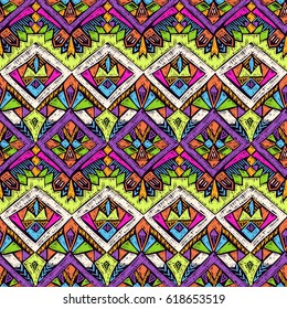 Tribal doodle pattern. Ethnic texture. Summer fabric design. Scribble geometric tribe shapes. Native seamless ornament for clothes or interior textile.