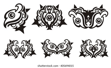 Tribal eagle eye and symbols from it. Ornate stylized peaked eagle head with an eye and the decorative elements formed from it. Black on the white