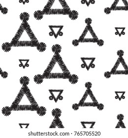 Tribal embroidery with dotted triangles. Vector abstract seamless pattern. Black graphic on white background. Geometric embroideries shapes in minimalistic ethnic, boho, aztec, hipster style.