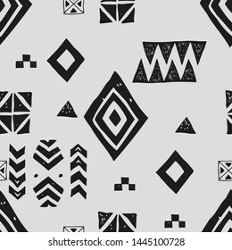 Tribal ethnic background. Stylish primitive geometric seamless pattern. Trendy print modern abstract wallpaper with grunge texture vector illustration. Monochrome ornament fabric textile