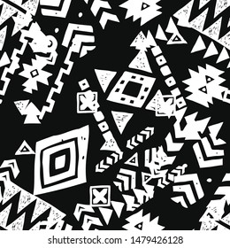 Tribal ethnic background. Stylish primitive geometric seamless pattern. Abstract wallpaper with grunge texture vector illustration. Monochrome ornament fabric textile. White on black