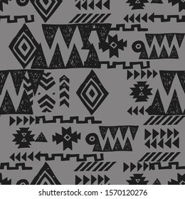 Tribal ethnic background. Stylish primitive geometric seamless pattern. Trendy print wallpaper with grunge texture vector illustration. Monochrome ornament fabric textile