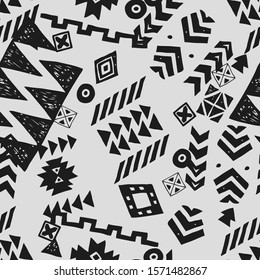 Tribal ethnic background. Stylish primitive geometric seamless pattern. Trendy print wallpaper with grunge texture vector illustration. Monochrome ornament fabric textile