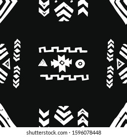 Tribal ethnic background. Stylish primitive geometric seamless pattern. Abstract wallpaper with grunge texture vector illustration. Monochrome ornament fabric textile. White on black