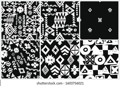 Tribal ethnic backgrounds. Stylish primitive geometric seamless pattern set. Trendy print grunge texture vector illustration. Monochrome fabric textile. White on black