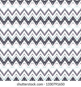 Tribal ethnic Ikat folklore pattern. African abstract ornament. Vector Fashion print. Seamless pattern tile. Retro chevron vector background. Geometric folk decorative texture