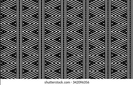 Tribal ethnic seamless african pattern. Vector illustration for print, textile design and background. White stripes and dots on a black background in african style. Stylish decoration, ornament.