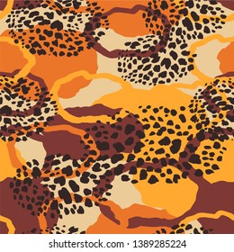 Tribal ethnic seamless pattern with animal print. Hand made effect. Vector background