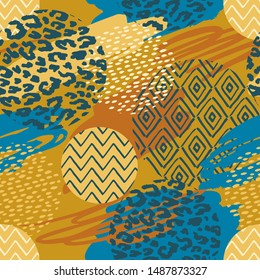 Tribal ethnic seamless pattern with animal print and brush strokes. Hand made effect. Vector background