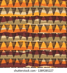 Tribal ethnic seamless pattern with geometric elements. Hand made effect. Vector background