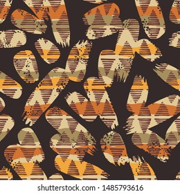 Tribal ethnic seamless pattern with geometric elements and brush strokes. Hand made effect. Vector background