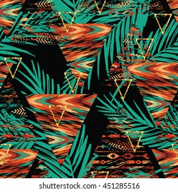 Tribal ethnic seamless pattern with geometric elements and palm leaves. Vector background