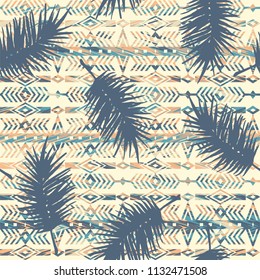 Tribal ethnic seamless pattern with palm leaves. Vector background