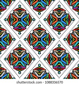 Tribal geometric colorful vector seamless pattern on the white background. Native aztec style ethnic ornaments. Rhombus, frames, abstract free shapes. Decorative design for clothes, fabric, printing