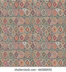 Tribal geometric seamless pattern in ethnic style, traditional motifs, decorative texture of bright colored shapes.