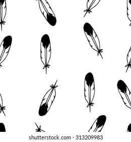 Tribal hand drawn feathers in black on white background