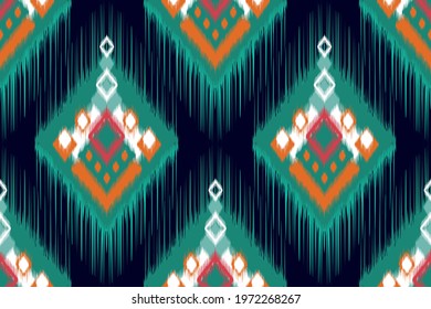 Tribal Indian ikat seamless pattern design. Aztec fabric carpet mandala ornament native boho chevron textile decoration. Geometric African American vector illustrations background.