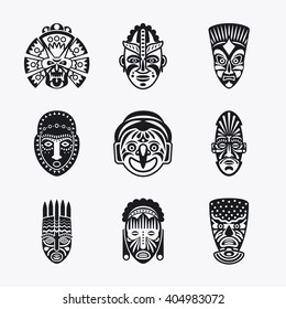 Tribal mask icons. Monochrome ethnic masks vector images on white background