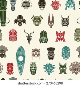 Tribal mask seamless pattern design in colors