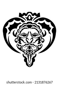 Tribal mask. Traditional totem symbol. Black tattoo in the style of the ancient tribes.