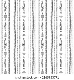 Tribal mud cloth African inspired ethnic hand drawn vector seamless pattern. Folk traditional black and white ornament. Boho vertical stripes background for home fabric textile wall paper design.