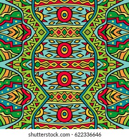 Tribal pattern in red and green colors. Abstract seamless ethnic ornament. Repeatable background design. Tile able fancy backdrop. Aztec style inspired art. Vector illustration.