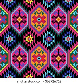 Tribal seamless colorful geometric pattern.