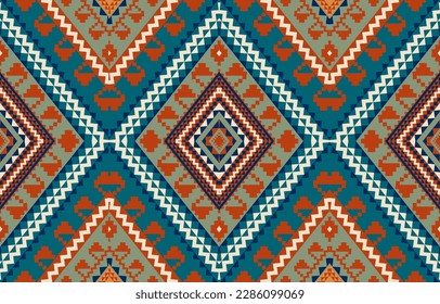 Patrón de diseño tribal sin fisuras aplicado en colores contrastantes, verde y naranja. Para papel pintado, ropa, envoltura, batik, tela, ilustración vectorial. Estilo bordado.