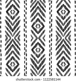 Tribal seamless pattern. Black and white vector illustration. Ethnic ornament in the Aztec, Navajo and American Indian style. Can be used for textile, background, wallpaper or wrapping paper.
