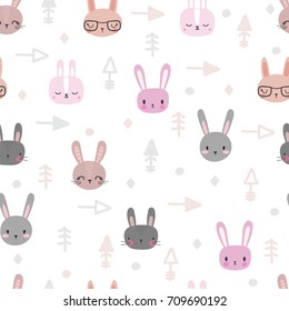 Tribal seamless pattern with cartoon rabbits. Abstract geometric art print. Hand drawn ethnic background with cute animals. Vector illustration