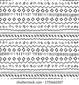 Tribal seamless pattern. Shabby small geometric pattern. Pattern of free-drawn lines and shapes.