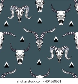 Tribal seamless pattern with skulls of animals, hand drawn icons. Ethnic ornament, backdrop vector. Decorative wallpaper, good for printing