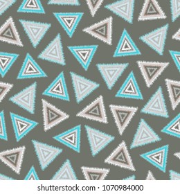 tribal seamless pattern of triangles - vector illustration. Triangles are arranged chaotically.