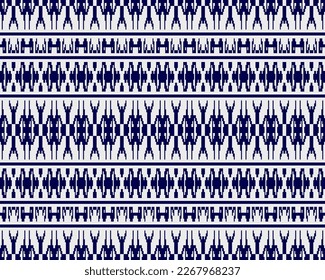 Tribal seamless pattern vector in blue white colors. Print with african tribe border motifs. Ethic texture. Background for cloth, fabric, wallpaper, curtain, carpet, wrapping paper and card template.