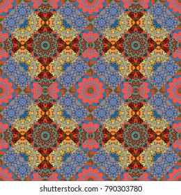 Tribal seamless pattern. Vector repeating geometric mesh tiles. Ethnic design. Striped pattern with ethnic tribal motifs, zigzag lines, Mandalas, brushstrokes paint in pink, blue and orange colors.